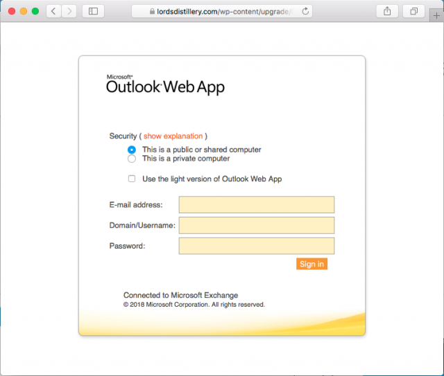A fake Outlook login page is presented by the link.