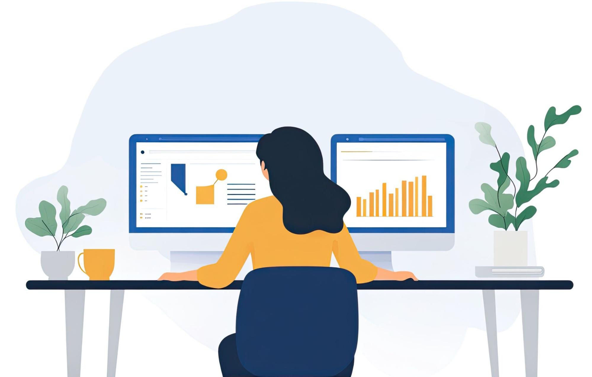 person at desk in front of monitors with data charts showing