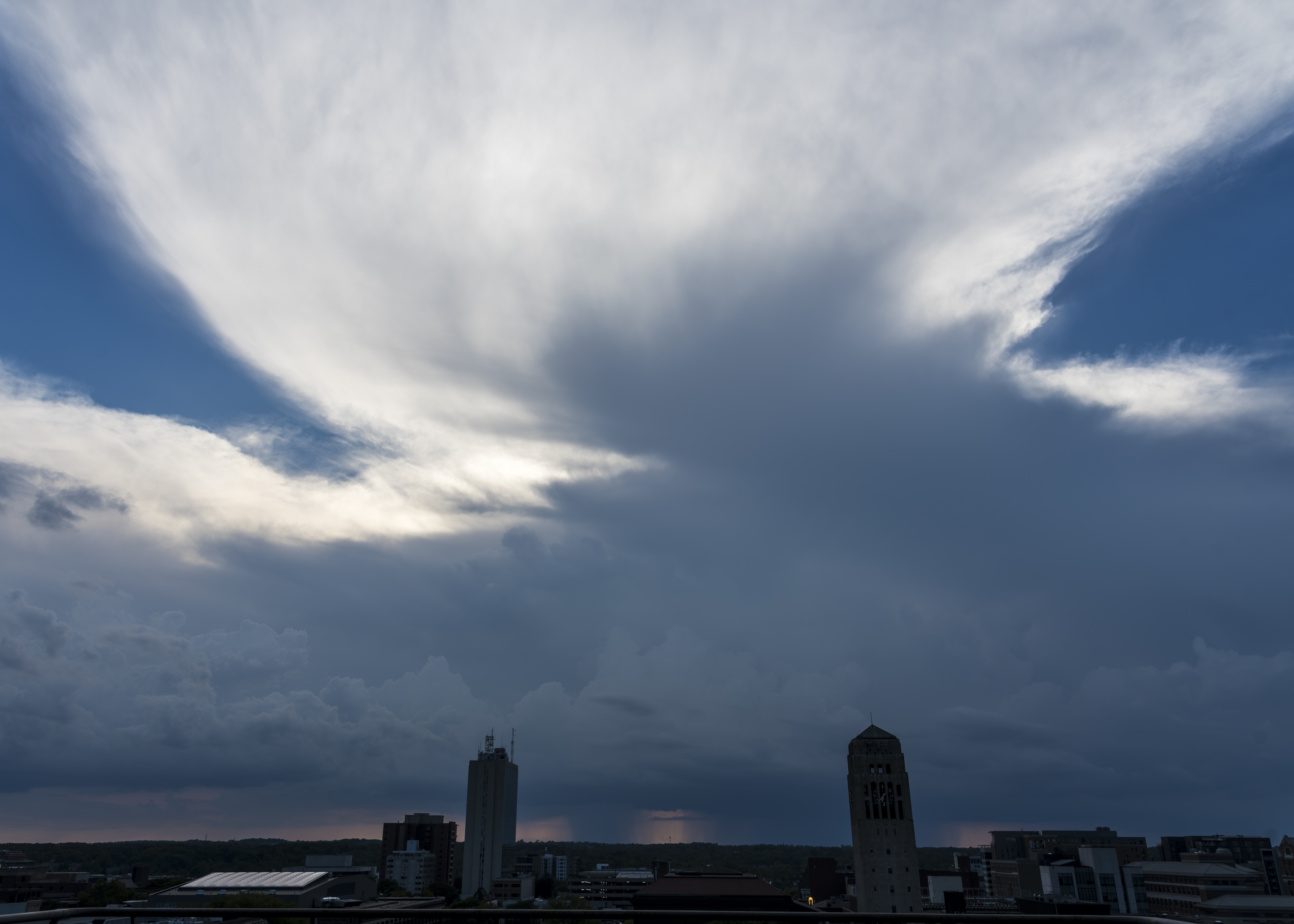 Sunset with light clouds over U-M School of Dentistry by Dion Taylor