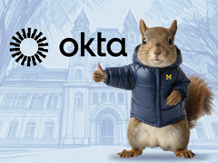 Okta logo with squirrel wearing a UofM puffy coat and giving thumbs up