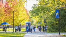 UM-Dearborn campus in Fall with students walking