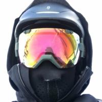 Image of Chris Giliard in a full-face helmet.