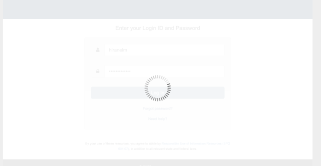 White screen with spinning wheel that displays after login credentials are entered into fake Weblogin screen